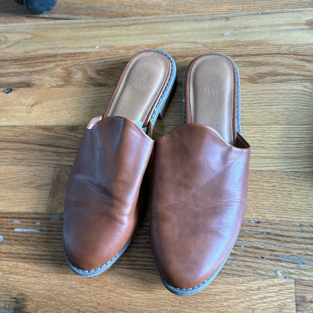 Brown slide on shoes